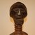 Songye. <em>Head</em>, 20th century. Wood, cowrie shell, fiber, organic materials, 7 1/2 x 2 3/4 x 3 3/8 in. (19 x 7 x 8.5 cm). Brooklyn Museum, Gift in memory of Frederic Zeller, 2014.54.45 (Photo: Brooklyn Museum, CUR.2014.54.45_detail2.jpg)
