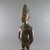 Yorùbá artist. <em>Male twin figure (Ère Ìbejì)</em>, 20th century. Wood, pigment, beads, 11 7/16 x 3 15/16 x 2 3/8 in. (29 x 10 x 6 cm). Brooklyn Museum, Gift in memory of Frederic Zeller, 2014.54.53 (Photo: Brooklyn Museum, CUR.2014.54.53_threequarter.jpg)