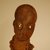Bamum. <em>Figure</em>, 20th century. Wood, textile, teeth, reed, metal, 8 1/4 x 2 9/16 x 3 1/8 in. (21 x 6.5 x 8 cm). Brooklyn Museum, Gift in memory of Frederic Zeller, 2014.54.8 (Photo: Brooklyn Museum, CUR.2014.54.8_detail.jpg)