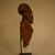 Bamum. <em>Figure</em>, 20th century. Wood, textile, teeth, reed, metal, 8 1/4 x 2 9/16 x 3 1/8 in. (21 x 6.5 x 8 cm). Brooklyn Museum, Gift in memory of Frederic Zeller, 2014.54.8 (Photo: Brooklyn Museum, CUR.2014.54.8_side2.jpg)