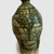 Okabe Mineo (Japanese, 1919–1990). <em>Bottle Vase</em>, ca. 1970. Stoneware with oribe glaze, 8 11/16 × 4 5/16 in. (22 × 11 cm). Brooklyn Museum, Partial gift of Steven Korff and Marcia Van Wagner and Bertram H. Schaffner Asian Art Fund, 2020.1.2 (Photo: , CUR.2020.1.2_side1_edited.jpg)