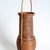 Iizuka Rokansai (Japanese, 1890–1958). <em>Mallet-Shaped Basket</em>, first half of 20th century. Bamboo, 14 3/16 × 5 × 4 5/8 in. (36 × 12.7 × 11.7 cm). Brooklyn Museum, Gift of Diane and Arthur Abbey, New York, NY, 2024.79.11 (Photo: Photo: Diane and Arthur Abbey, CUR.2024.79.11a-b.jpg)
