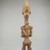 Lulua. <em>Woman with Child on Back (Lupingu Lua Luimpe)</em>, early 20th century. Wood, 11 1/2 x 2 1/2 x 3 in. (29.2 x 6.4 x 7.6 cm). Brooklyn Museum, Museum Expedition 1922, Robert B. Woodward Memorial Fund, 22.107. Creative Commons-BY (Photo: Brooklyn Museum, CUR.22.107_back_PS5.jpg)