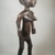 Bamana. <em>Figure of a Standing Female (Nyeleni)</em>, late 19th or early 20th century. Wood, metal, shells, 20 3/4 x 6 1/2 x 7in. (52.7 x 16.5 x 17.8cm). Brooklyn Museum, Museum Expedition 1922, Robert B. Woodward Memorial Fund, 22.1094. Creative Commons-BY (Photo: Brooklyn Museum, CUR.22.1094_threequarter_PS5.jpg)