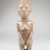 Possibly Vili. <em>Kneeling Female Figure</em>, late 19th or early 20th century. Wood, applied materials, 8 1/2 x 2 3/8 in. (21.6 x 6 cm). Brooklyn Museum, Museum Expedition 1922, Robert B. Woodward Memorial Fund, 22.1140. Creative Commons-BY (Photo: Brooklyn Museum, CUR.22.1140_front_PS5.jpg)