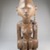 Yombe. <em>Female Figure Seated on Animal</em>, 19th century. Wood, seed pod, plastic beads, copper alloy, 12 x 4 x 3 3/4in. (30.5 x 10.2 x 9.5cm). Brooklyn Museum, Museum Expedition 1922, Robert B. Woodward Memorial Fund, 22.1141. Creative Commons-BY (Photo: Brooklyn Museum, CUR.22.1141_front_PS5.jpg)