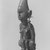 Yombe. <em>Female Figure Seated on Animal</em>, 19th century. Wood, seed pod, plastic beads, copper alloy, 12 x 4 x 3 3/4in. (30.5 x 10.2 x 9.5cm). Brooklyn Museum, Museum Expedition 1922, Robert B. Woodward Memorial Fund, 22.1141. Creative Commons-BY (Photo: Brooklyn Museum, CUR.22.1141_print_threequarter_bw.jpg)