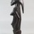 Possibly Luba. <em>Figure of a Standing Female</em>, late 19th or early 20th century. Wood, 9 5/8 x 5/16 in. (24.4 x 0.8 cm). Brooklyn Museum, Museum Expedition 1922, Robert B. Woodward Memorial Fund
, 22.114. Creative Commons-BY (Photo: Brooklyn Museum, CUR.22.114_side_PS5.jpg)