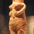 Cypriot. <em>Female Figure</em>, ca. 1450-1200 B.C.E. Terracotta, pigment, 3 9/16 x 2 3/16 x 2 1/16 in. (9.1 x 5.5 x 5.3 cm). Brooklyn Museum, Gift of Mrs. Frederic H. Betts, 22.12. Creative Commons-BY (Photo: Brooklyn Museum, CUR.22.12_kev09.jpg)