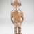 Kongo. <em>Standing Female Figure (Nkisi)</em>, 19th century. Wood, glass mirror, plastic beads, cotton cordage, applied materials, 9 x 2 3/4 x 2 1/2 in. (22.9 x 7.0 x 6.4 cm). Brooklyn Museum, Museum Expedition 1922, Robert B. Woodward Memorial Fund, 22.1444. Creative Commons-BY (Photo: Brooklyn Museum, CUR.22.1444_back_PS5.jpg)