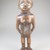 Kongo. <em>Standing Female Figure (Nkisi)</em>, 19th century. Wood, glass mirror, plastic beads, cotton cordage, applied materials, 9 x 2 3/4 x 2 1/2 in. (22.9 x 7.0 x 6.4 cm). Brooklyn Museum, Museum Expedition 1922, Robert B. Woodward Memorial Fund, 22.1444. Creative Commons-BY (Photo: Brooklyn Museum, CUR.22.1444_front_PS5.jpg)