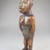 Kongo. <em>Standing Female Figure (Nkisi)</em>, 19th century. Wood, glass mirror, plastic beads, cotton cordage, applied materials, 9 x 2 3/4 x 2 1/2 in. (22.9 x 7.0 x 6.4 cm). Brooklyn Museum, Museum Expedition 1922, Robert B. Woodward Memorial Fund, 22.1444. Creative Commons-BY (Photo: Brooklyn Museum, CUR.22.1444_threequarter_PS5.jpg)
