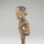 Lulua. <em>Figure of a Squatting Male</em>, early 20th century. Wood, 4 1/2 x 1 1/4 x 1 1/4 in. (11.4 x 3.2 x 3.2 cm). Brooklyn Museum, Museum Expedition 1922, Robert B. Woodward Memorial Fund, 22.1448. Creative Commons-BY (Photo: Brooklyn Museum, CUR.22.1448_side_PS5.jpg)