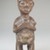 Mbala. <em>Standing Female Figure</em>, 19th or early 20th century. Wood, fiber, organic materials, 6 7/8 x 2 1/4 x 2in. (17.5 x 5.7 x 5.1cm). Brooklyn Museum, Museum Expedition 1922, Robert B. Woodward Memorial Fund, 22.1451. Creative Commons-BY (Photo: Brooklyn Museum, CUR.22.1451_front_PS5.jpg)