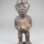 Vili. <em>Standing Male Figure (Nkonde)</em>, 19th century. Wood, resin, glass mirror, ferrous nails, 7 3/4 x 2 1/2 x 2in. (19.7 x 6.4 x 5.1cm). Brooklyn Museum, Museum Expedition 1922, Robert B. Woodward Memorial Fund, 22.1458. Creative Commons-BY (Photo: Brooklyn Museum, CUR.22.1458_front_PS5.jpg)