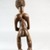 Luba. <em>Standing Female Figure</em>, late 19th or early 20th century. Wood, 9 x 2 1/4 x 2 3/4 in. (22.9 x 5.7 x 7 cm). Brooklyn Museum, Museum Expedition 1922, Robert B. Woodward Memorial Fund, 22.166. Creative Commons-BY (Photo: Brooklyn Museum, CUR.22.166_back_PS5.jpg)