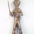 Bwayen (We, flourished 1920s-1930s). <em>Standing Female Nude Holding a Knife</em>, late 19th or early 20th century. Copper alloy, 8 1/2 x 4 3/4 x 2 3/4 in. (21.6 x 12.1 x 7 cm). Brooklyn Museum, Museum Expedition 1922, Robert B. Woodward Memorial Fund, 22.221. Creative Commons-BY (Photo: Brooklyn Museum, CUR.22.221_front_PS5.jpg)