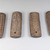 Shona. <em>Set of Four Divination Dice (Hakata)</em>, late 19th or early 20th century. Ivory (or Wood, possibly), a: 4 1/2 x 1 3/4 x 7/8 in. (11.4 x 4.5 x 2.2 cm). Brooklyn Museum, Museum Expedition 1922, Robert B. Woodward Memorial Fund, 22.488a-d. Creative Commons-BY (Photo: Brooklyn Museum, CUR.22.488a-d_front_PS5.jpg)