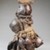 Yombe. <em>Standing Figure with Seed Pods and Beaks of Hornbill</em>, late 19th or early 20th century. Wood, beaks of hornbills, seedpods, string, 6 1/2 x 4 x 3 1/2 in. (16.5 x 10.2 x 8.9 cm). Brooklyn Museum, Museum Expedition 1922, Robert B. Woodward Memorial Fund, 22.497. Creative Commons-BY (Photo: Brooklyn Museum, CUR.22.497_side_PS5.jpg)