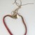 Possibly Zulu. <em>Body Ornament</em>, late 19th-early 20th century. Glass beads, natural fiber thread, 3/8 x 18 11/16 in. (1 x 47.5 cm). Brooklyn Museum, Gift of Thomas A. Eddy, 22.589. Creative Commons-BY (Photo: Brooklyn Museum, CUR.22.589_front_PS5.jpg)