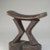 Kuba. <em>Headrest</em>, late 19th or early 20th century. Wood, 5 5/16 x 5 5/16 x 2 1/2 in. (13.5 x 13.5 x 6.4 cm). Brooklyn Museum, Museum Expedition 1922, Robert B. Woodward Memorial Fund, 22.732. Creative Commons-BY (Photo: Brooklyn Museum, CUR.22.732_threequarter_PS5.jpg)