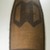 Banda, Mbugbu sub-group. <em>Shield</em>, late 19th century. Fiber, wood (handle), 51 3/16 x 17 11/16 in. (130 x 45 cm). Brooklyn Museum, Museum Expedition 1922, Robert B. Woodward Memorial Fund, 22.847. Creative Commons-BY (Photo: Brooklyn Museum, CUR.22.847_front_PS5.jpg)