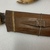  <em>Knife and Scabbard</em>. Wood, Knife: 3 1/8 x 23 5/8 in. (8 x 60 cm). Brooklyn Museum, Robert B. Woodward Memorial Fund, 24.247a-b. Creative Commons-BY (Photo: , CUR.24.247a-b_detail02.jpg)