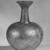 Roman. <em>Vase</em>, 1st-5th century C.E. Glass, 11 1/4 x diam. 3 5/8 in. (28.5 x 9.2 cm)  . Brooklyn Museum, Gift of Mrs. Henry Morgenthau, 25.20. Creative Commons-BY (Photo: Brooklyn Museum, CUR.25.20_negA_bw.jpg)