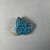  <em>Fragment from a Vase</em>, ca. 1352–1336 B.C.E. Faience, 1 11/16 × 2 3/16 × 1/2 in. (4.3 × 5.5 × 1.3 cm). Brooklyn Museum, Gift of the Egypt Exploration Society, 25.881. Creative Commons-BY (Photo: Brooklyn Museum, CUR.25.881_front01.JPG)