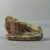  <em>Fragmentary Group of Apes</em>, ca. 1352-1336 B.C.E. Limestone, pigment, 1 5/16 × 9/16 × 2 1/16 in. (3.3 × 1.5 × 5.3 cm). Brooklyn Museum, Gift of the Egypt Exploration Society, 25.886.11. Creative Commons-BY (Photo: , CUR.25.886.11_view01.jpg)