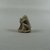 <em>Small Figure of a Seated Monkey</em>, ca. 1352-1336 B.C.E. Limestone, 1 3/8 x 9/16 x 1 1/8 in. (3.5 x 1.4 x 2.9 cm). Brooklyn Museum, Gift of the Egypt Exploration Society, 25.886.9. Creative Commons-BY (Photo: , CUR.25.886.9_view01.jpg)