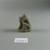  <em>Small Figure of a Seated Monkey</em>, ca. 1352-1336 B.C.E. Limestone, 1 3/8 x 9/16 x 1 1/8 in. (3.5 x 1.4 x 2.9 cm). Brooklyn Museum, Gift of the Egypt Exploration Society, 25.886.9. Creative Commons-BY (Photo: Brooklyn Museum, CUR.25.886.9_view2.jpg)