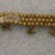  <em>Bracelet or Necklace Fragment</em>. Brass, beads, glass, 7 1/16 x 7/8 in. (18 x 2.2 cm). Brooklyn Museum, 25600. Creative Commons-BY (Photo: Brooklyn Museum, CUR.25600_back.jpg)