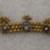  <em>Bracelet or Necklace Fragment</em>. Brass, beads, glass, 7 1/16 x 7/8 in. (18 x 2.2 cm). Brooklyn Museum, 25600. Creative Commons-BY (Photo: Brooklyn Museum, CUR.25600_front.jpg)