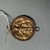 Roman. <em>Disks</em>, 1st century B.C.E.-1st cnetury C.E. Gold, 1 x 1 5/16 in. (2.6 x 3.4 cm). Brooklyn Museum, Gift of George D. Pratt, 26.765.1-.2. Creative Commons-BY (Photo: Brooklyn Museum, CUR.26.765.2_overall.JPG)