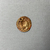 Roman. <em>Thin Disk</em>, 3rd century C.E. Gold, Diam. 13/16 in. (2 cm). Brooklyn Museum, Gift of George D. Pratt, 26.767. Creative Commons-BY (Photo: Brooklyn Museum, CUR.26.767_back.JPG)