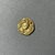 Roman. <em>Thin Disk</em>, 3rd century C.E. Gold, Diam. 13/16 in. (2 cm). Brooklyn Museum, Gift of George D. Pratt, 26.767. Creative Commons-BY (Photo: Brooklyn Museum, CUR.26.767_overall.JPG)