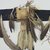 Lakota, Sioux. <em>Feathered Bonnet Trailer</em>, late 19th-early 20th century. Wool cloth, eagle feathers, rawhide, dyed horsehair, tin cones, porcupine quill, 72 13/16 x 20 1/2 in.  (185 x 52 cm). Brooklyn Museum, Robert B. Woodward Memorial Fund, 26.803.1. Creative Commons-BY (Photo: Brooklyn Museum, CUR.26.803_view2.jpg)
