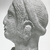 Roman. <em>Head of Woman</em>, 1st century B.C.E., probably. Clay, 4 1/8 × 2 13/16 × 2 1/2 in. (10.4 × 7.1 × 6.4 cm). Brooklyn Museum, Gift of the Long Island Historical Society, 28.766. Creative Commons-BY (Photo: Brooklyn Museum, CUR.28.766_NegD_print_bw.jpg)