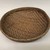  <em>Shallow Basket</em>. Plant fiber, wood, 4 × 15 1/4 × 14 1/2 in. (10.2 × 38.7 × 36.8 cm). Brooklyn Museum, Museum Expedition 1930, Robert B. Woodward Memorial Fund and the Museum Collection Fund, 30.1385. Creative Commons-BY (Photo: Brooklyn Museum, CUR.30.1385_view02.jpg)