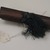 <em>Clapper (P'ak-pan)</em>. Wood, silk, 1 5/16 x 6 3/4 in. (3.4 x 17.2 cm). Brooklyn Museum, Estate of Stewart Culin, Museum Purchase, 30.184. Creative Commons-BY (Photo: Brooklyn Museum, CUR.30.184.jpg)