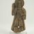 Coptic. <em>Figure of a Saint Holding Book in Left Hand</em>, 10th-11th century C.E. Wood, 3 3/8 x 3/4 x 8 9/16 in. (8.6 x 1.9 x 21.8 cm). Brooklyn Museum, Gift of Ruth Tishner Costantino, 30.27. Creative Commons-BY (Photo: Brooklyn Museum (in collaboration with Index of Christian Art, Princeton University), CUR.30.27_view1_ICA.jpg)