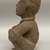  <em>Seated Male Figure</em>, 1000-1550. Volcanic stone (Andesite), 11 3/4 x 7 x 5 1/2 in. (29.8 x 17.8 x 14 cm). Brooklyn Museum, Gift of Mrs. Minor C. Keith in memory of her husband, 31.1692. Creative Commons-BY (Photo: Brooklyn Museum, CUR.31.1692_side01.jpg)