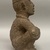  <em>Seated Male Figure</em>, 1000-1550. Volcanic stone (Andesite), 11 3/4 x 7 x 5 1/2 in. (29.8 x 17.8 x 14 cm). Brooklyn Museum, Gift of Mrs. Minor C. Keith in memory of her husband, 31.1692. Creative Commons-BY (Photo: Brooklyn Museum, CUR.31.1692_side02.jpg)