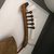 Mangbetu. <em>Harp (Kundi)</em>, early 20th century. Wood, hide, 15 1/8 × 7 3/4 × 24 in. (38.4 × 19.7 × 61 cm). Brooklyn Museum, Museum Expedition 1931, Robert B. Woodward Memorial Fund, 31.1809a-g. Creative Commons-BY (Photo: Brooklyn Museum, CUR.31.1809e-g.jpg)