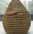  <em>Cone Shaped Basket with Cover</em>, early 20th century. Reed, raffia, height: 6 3/4 in. (16.9 cm). Brooklyn Museum, Gift of Theodora Wilbour, 32.1772a-b. Creative Commons-BY (Photo: Brooklyn Museum, CUR.32.1772a-b_side.jpg)