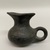 Hopi Pueblo. <em>Pitcher</em>. Pottery, 3 5/16 × 4 1/2 × 3 1/8 in. (8.4 × 11.4 × 7.9 cm). Brooklyn Museum, Gift of Mrs. E.D. Stone, 32.2093.31389. Creative Commons-BY (Photo: Brooklyn Museum, CUR.32.2093.31389_view02.jpg)