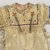 Possibly Apache. <em>Fringed and Beaded Dress</em>, early 20th century. Buckskin, beads Brooklyn Museum, Bequest of W.S. Morton Mead, 32.2099.32583. Creative Commons-BY (Photo: Brooklyn Museum, CUR.32.2099.32583_view2.jpg)