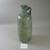 Roman. <em>Bottle with Incised Line Decoration</em>, 2nd-early 3rd century C.E. Glass, 8 1/16 x greatest diam. 3 1/8 in. (20.4 x 7.9 cm). Brooklyn Museum, Frederick Loeser Fund, 33.401. Creative Commons-BY (Photo: Brooklyn Museum, CUR.33.401_view1.jpg)