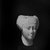  <em>Model of a Woman's Head</em>, 332-30 B.C.E. Plaster, 3 3/8 × 2 1/2 in. (8.6 × 6.4 cm). Brooklyn Museum, Charles Edwin Wilbour Fund, 33.592. Creative Commons-BY (Photo: Brooklyn Museum, CUR.33.592_NegA_print.bw.jpg)